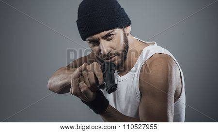Poster: Handsome Criminal Holding A Gun