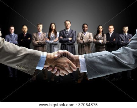 Picture or Photo of Handshake isolated on business background