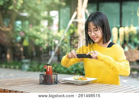 Poster: Young Asian Woman Food Blogger