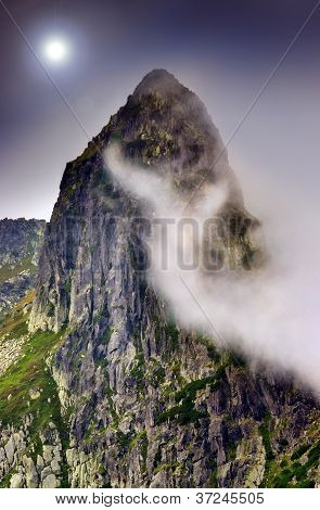 Picture or Photo of Dark scene of mountain landscape with mist and tall rock
** Note: Slight blurriness, best at smaller sizes