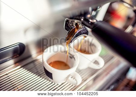Espresso Machine Pouring Coffee Into Cups At Restaurant Automatic Making Poster Espresso Machine Pouring Coffee Into Cups At Restaurant Automatic Making Poster