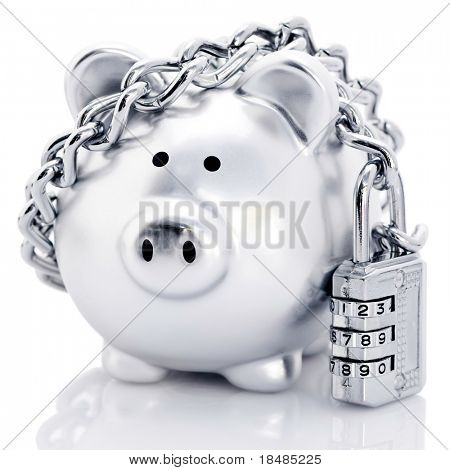 Picture or Photo of Silver piggy bank secured with padlock and chain, reflecting on white background.