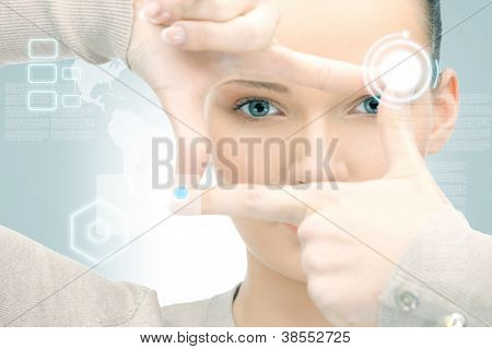 Picture or Photo of Picture of businesswoman creating frame with fingers
