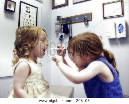 Picture or Photo of Two little girls in a medical office playing doctor ** Note: Slight blurriness, best at smaller sizes