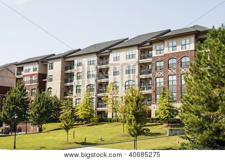 Picture or Photo of A large modern condominium or apartment building