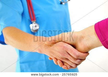 Picture or Photo of Doctor shaking hands shoot in studio on white background