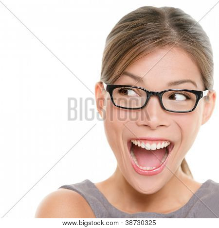 Picture or Photo of Excited woman looking sideways screaming of joy. Closeup of happy mixed race Asian Chinese / Caucasian female business woman isolated on white background.