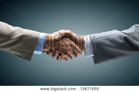 Picture or Photo of Handshake - Hand holding on black background