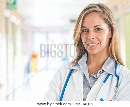 Picture or Photo of Portrait of a friendly female doctor